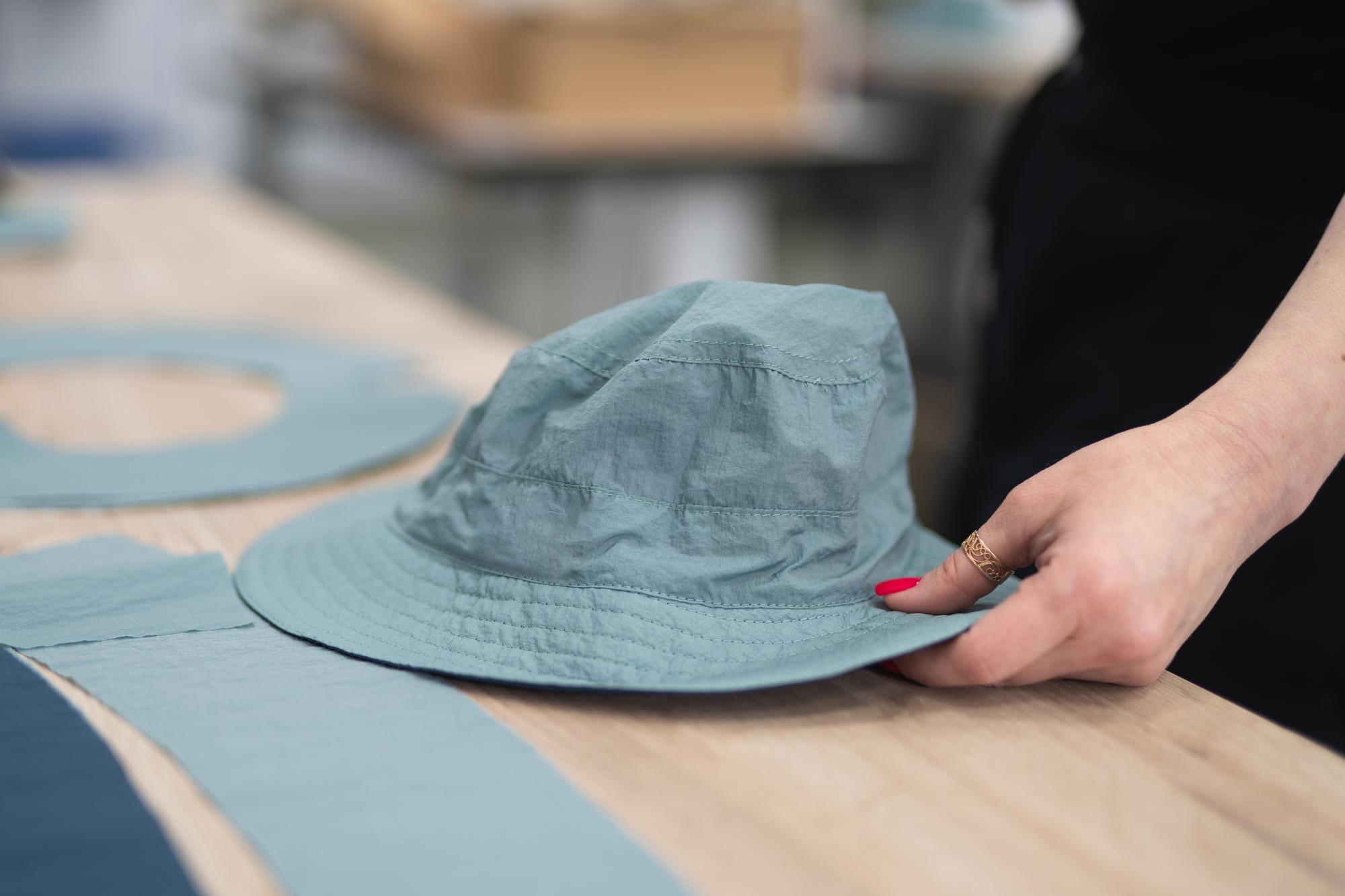 embroidered caps and apparel displayed